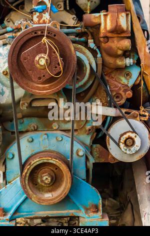 Rustic Industrial Engine Detail With Belts and Pulleys in Focus Stock Photo