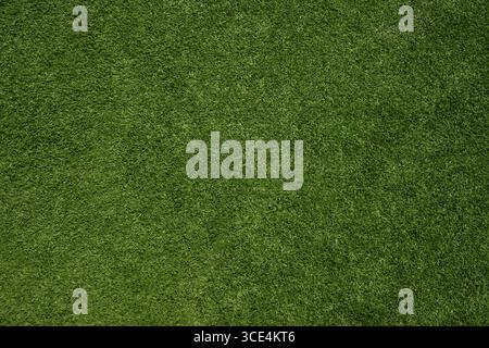 Lush green grass texture for backgrounds. Green Turf Texture Stock Photo