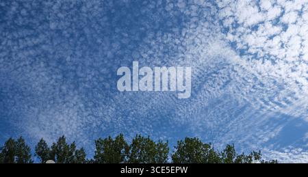 View of the sky in which fleecy clouds can be seen Stock Photo