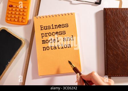 Business process model and notation BPMN is shown using a text. Stock Photo