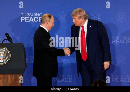 Anchorage, United States. 15th Aug, 2025. Russian President Vladimir Putin shakes hands with President Donald Trump after a joint press conference following a meeting at Joint Base Elmendorf-Richardson in Anchorage, Alaska on Friday, August 15, 2025. Trump and.Putin met to discuss the three-year conflict between Russia and Ukraine. Photo by Bob Strong/UPI Credit: UPI/Alamy Live News Stock Photo