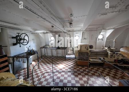Workshop with metalworking lathe and drilling and milling machines in Suur Toll steam-powered icebreaker ship from 1914 in the Estonian Maritime Museu Stock Photo