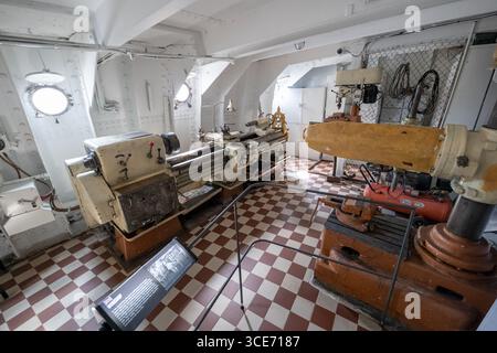 Workshop with metalworking lathe and drilling and milling machines in Suur Toll steam-powered icebreaker ship from 1914 in the Estonian Maritime Museu Stock Photo