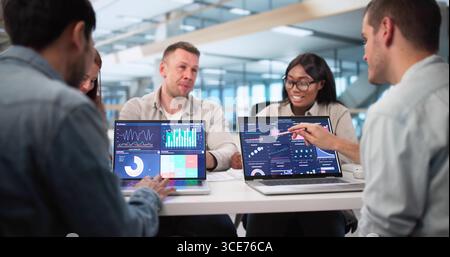 Multicultural Data Analyst Leading Virtual Meeting Using Predictive Analytics Stock Photo