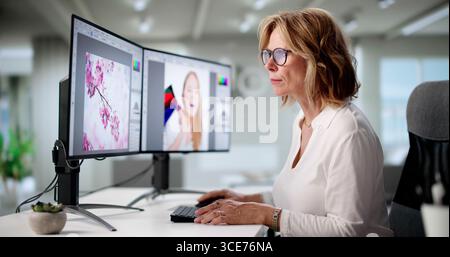 Senior Woman Working Late On Graphic Design Projects From Home Stock Photo