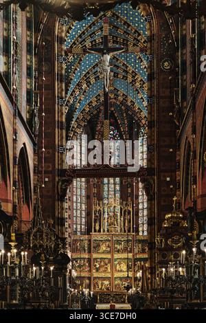 Interior of St. Mary’s Basilica in Krakow with Veit Stoss Altar and Crucifix Stock Photo