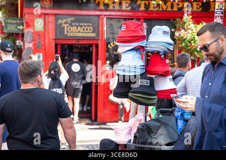 Dublin, Ireland – 16 August 2025 – Street vendors sell unofficial Oasis merchandise ahead of the first of two sold out Croke Park performances from the band. Credit: Liam Murphy/Alamy Live News Stock Photo