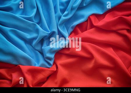 A red and blue wrinkled fabric texture background. Close up. Stock Photo