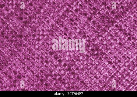 Macro, close up of pink woven burlap fabric, cloth texture with thick threads and rough textile pattern. Coarse textile surface with visible fibers. B Stock Photo