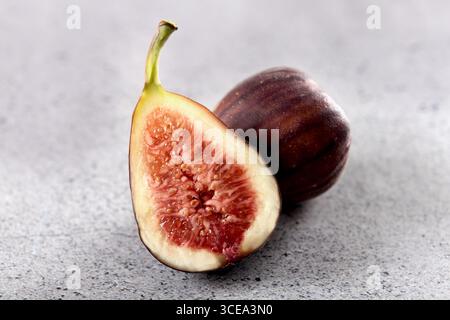 Fresh figs fruit on a gray background. Close up Stock Photo