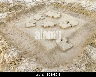 Sand sculptures on the beach of Mamora Bay, Antigua Stock Photo