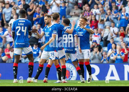 16 August 2025. Glasgow, UK. Rangers played Alloa Athletic at Ibrox Stadium, Glasgow, in the Premier Sports Cup. The final score was Rangers 4 - 2 Alloa Athletic. James Tavernier (R2) celebrates with Rangers players after he scored Rangers 3rd goal from a penalty in 67 minutes. Credit: Findlay / Alamy Live News Stock Photo