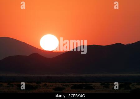 Vibrant sunset in Namib-Naukluft National Park, Namibia, Africa Stock Photo