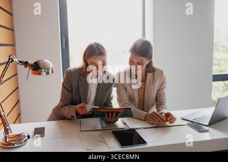 An Engaging and Collaborative Business Meeting Taking Place Between Two Professionals Stock Photo