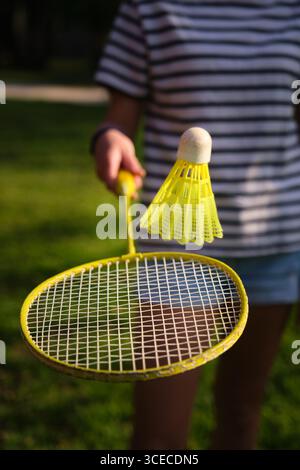 badminton shuttlecock on a racket close-up Stock Photo
