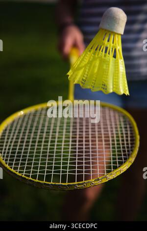 badminton shuttlecock on a racket close-up Stock Photo