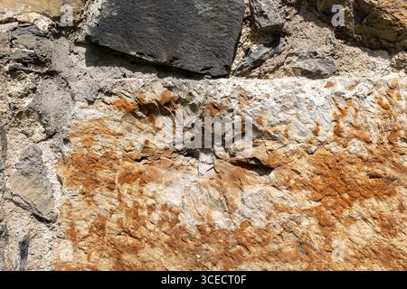 war damage on stone wall at Akershus fortress in Oslo, Norway Stock Photo