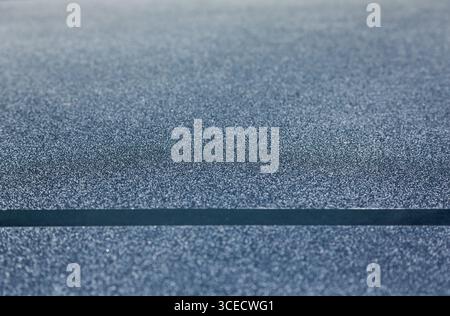 Dark blue matte finish with glossy stripe at the bottom. Stock Photo