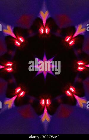 Abstract kaleidoscopic design featuring vibrant red and purple light patterns, creating a mesmerizing geometric arrangement. The image is vivid and sy Stock Photo