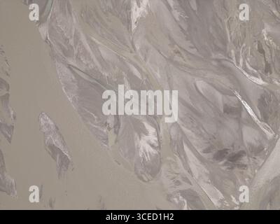 Aerial view of intricate riverbed patterns in Charasa, Nubra Valley, India, showcasing natural formations and textures created by water flow over time Stock Photo