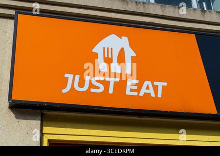 Wolverhampton, UK - August 13th 2025: External signage of Just Eat, a food delivery company Stock Photo