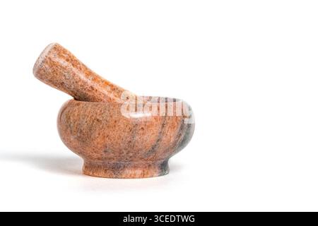 Mortar and pestle isolated on white background with Stock Photo