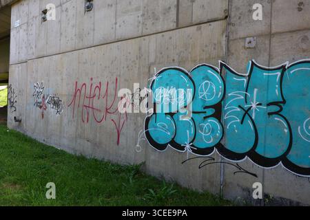 Close-up of graffiti detail with red and blue street art Stock Photo