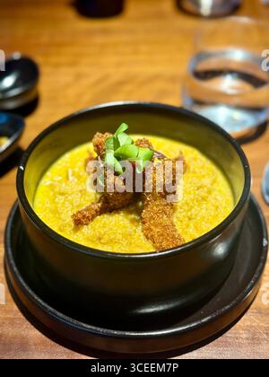 traditional-thai-green-curry-garnished-with-fresh-sweet-basil-leaves
