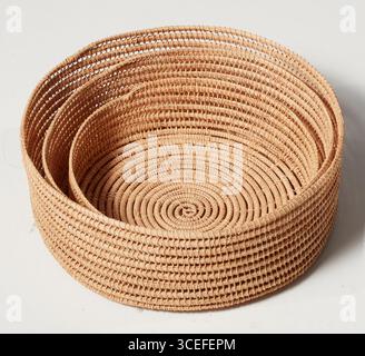 Three woven baskets stacked together solated nature background with clipping path Stock Photo