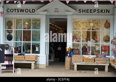 Front View of a Cozy Retail Store Displaying Fashion and Accessories. Bourton-on-the-Water, England Stock Photo