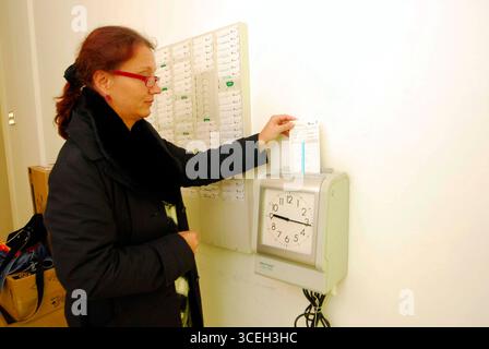 stechuhr als arbeitszeiterfassung stechuhr als arbeitszeiterfassung Stock Photo