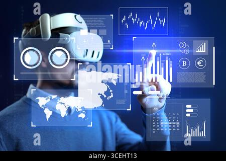 Virtual reality user interacts with digital financial data and charts in a futuristic setting Stock Photo