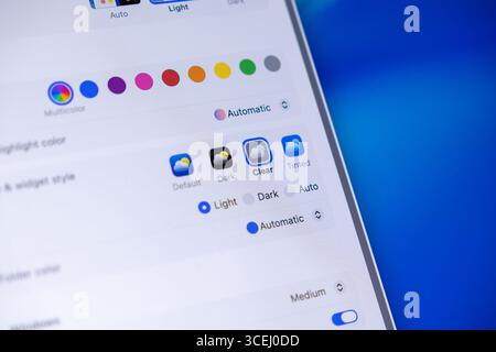 Poznan, Poland - August 15, 2025: Close-up view of macOS 26 Liquid Glass interface, showing Clear visual style selection, various color and widget sty Stock Photo