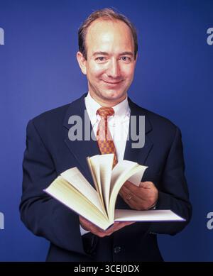 Jeff Bezos Using Computer Modern technology for the business mogul. a businessman using a laptop ...