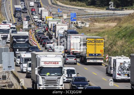 Permanent roadworks on the A8 motorway between Stuttgart and Karlsruhe with traffic jams. Six-lane widening of the A8 motorway near Pforzheim. Constru Stock Photo