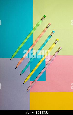 Colorful graphite pencils on a surface in different colors. Back to school. Stock Photo