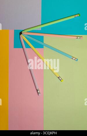 Colorful graphite pencils on a surface in different colors. Back to school. Stock Photo