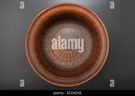 Clay bowl isolated on black background Stock Photo