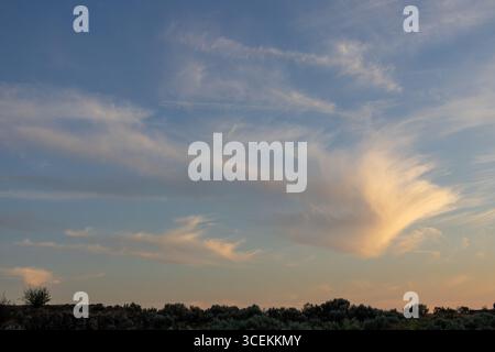 Cirrus clouds at sunset in the Eastern Washington desert Stock Photo