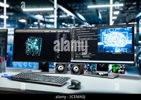 Close up of deep learning app running on PC monitors in data center with rows of operational server racks. Computer displays with artificial intelligence technology programs in server farm Stock Photo