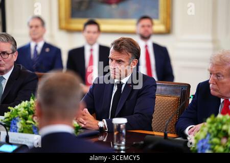 Anchorage, Alaska, USA. 15th Aug, 2025. President Emmanuel Macron of France participates in a Multilateral Meeting with European Leaders in the East Room of the White House in Washington, DC, USA, on Monday, August 18, 2025. The European Leaders are at the White House in support of President Zelenskyy following President Trumps meeting with President Vladimir Putin of Russia in Anchorage, Alaska, USA, on Friday, August 15, 2025. Credit: Aaron Schwartz/Pool via CNP/dpa/Alamy Live News Stock Photo