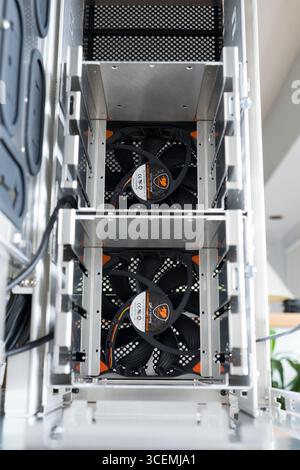 PWM fans installed inside empty Lian Li A79 aluminum computer case before installation of motherboard and hard-drives Stock Photo
