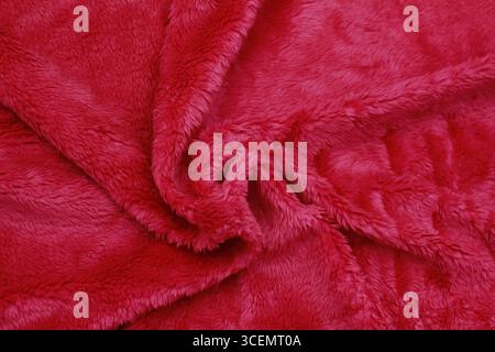 Overlay of red fiber cloth texture. Close-up view. Stock Photo