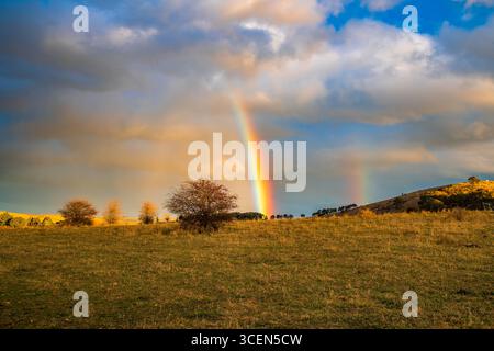 Rainbow over the countryside at Blayney in the Central West of NSW, Australia. Stock Photo
