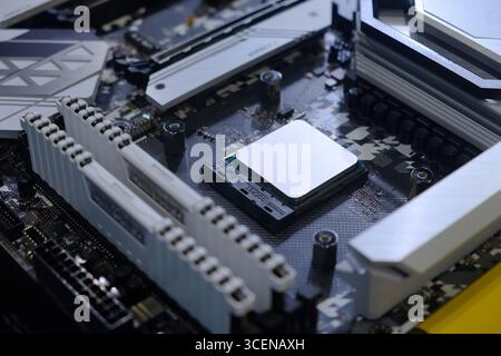 Close-up and selective focus hi-performance Processor that installed on CPU socket of computer mainboard for upgrade to work and entertainment Stock Photo