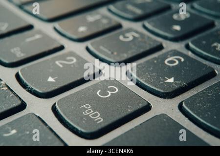 Numeric keys on laptop, macro view with focus on number 3. Stock Photo