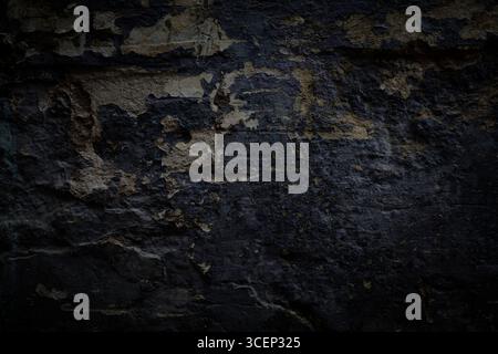Dark wall background. Rough dark grunge texture. Stock Photo