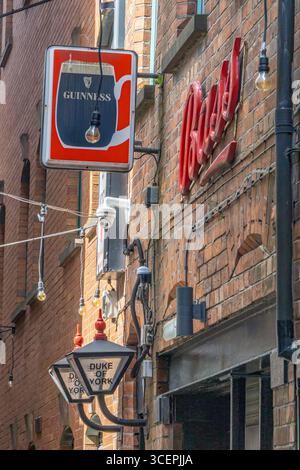 neon sign at entrance of pub in Belfast Stock Photo