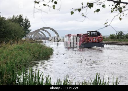 Passenger barge Antonine on the Union Canal Falkirk, approaching the upper entrance to the Falkirk Wheel. Stock Photo