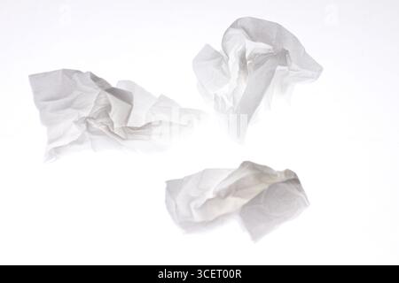Crumpled and dirty tissue paper isolated on white background. Stock Photo